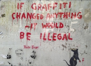 If graffiti changed anything —  it would be illegal.