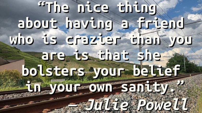 Quote on a picture of railroad tracks and the Côte Rôtie vineyards.